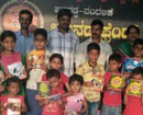 Karkala: Durgaparameshwari Friends Club distributes notebooks/stationery to students